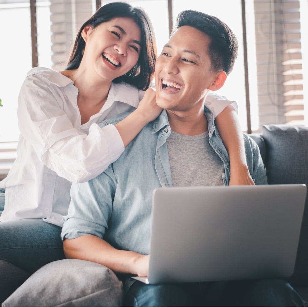 Happy couple after a successful cash-out refinance through House Numbers